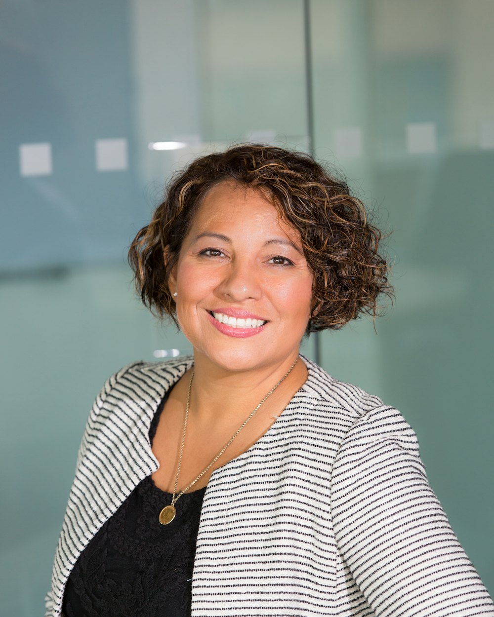 Maya Ellison, CPA, owner of Sunnyfield, in the office