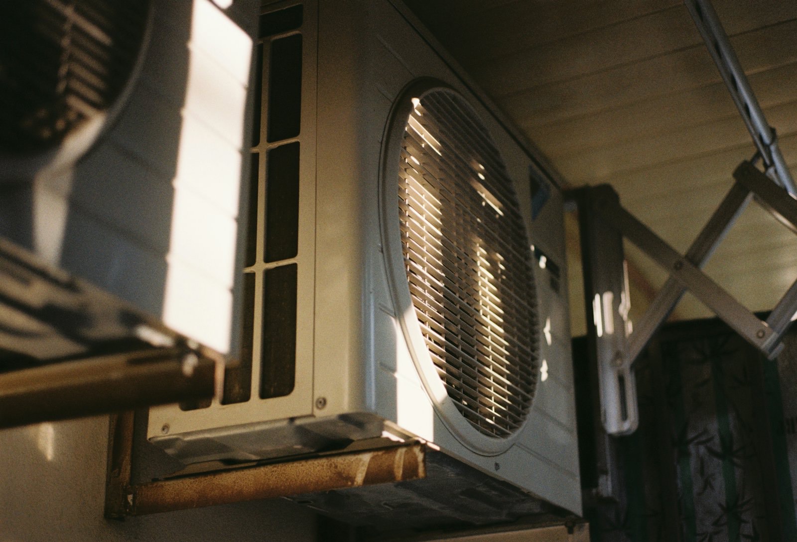 Outdoor air conditioning unit in afternoon sun