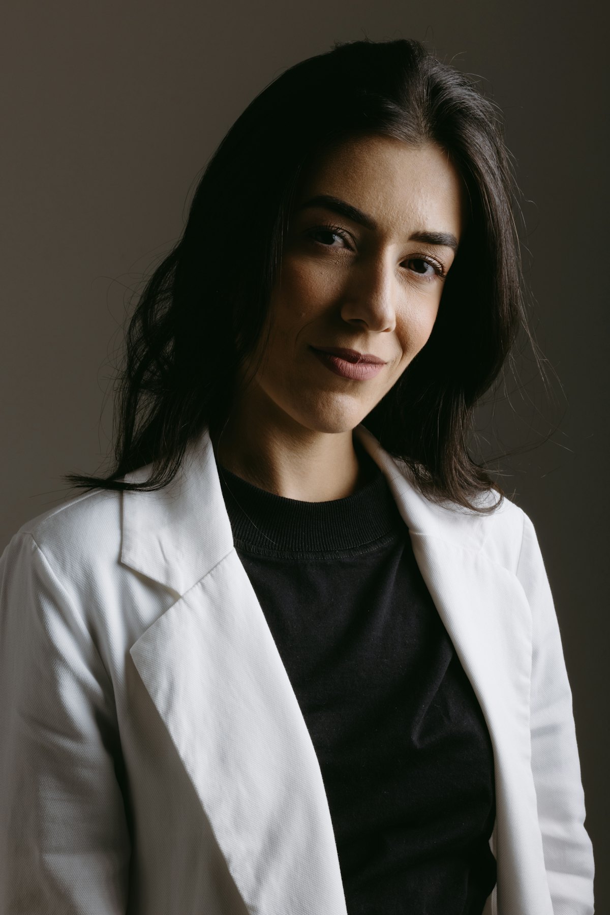 Portrait of Dr. Camille Aurelle in a white coat